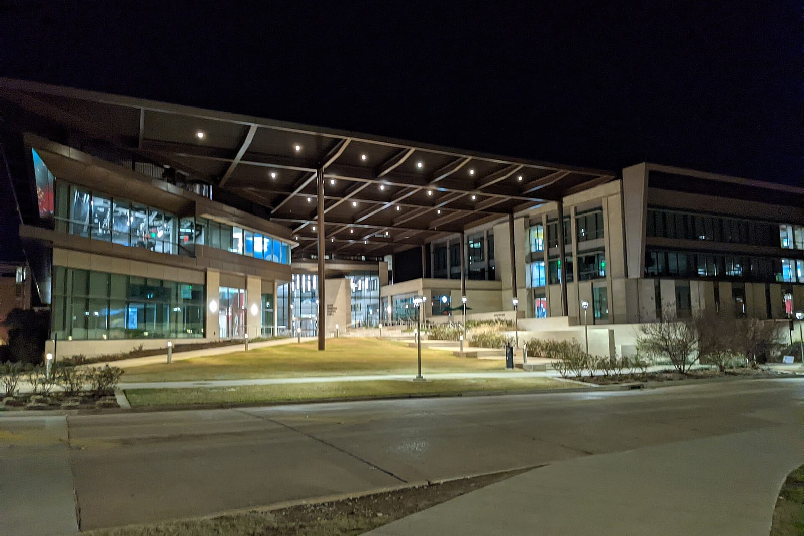 A Texas A&M campus building lit up at night